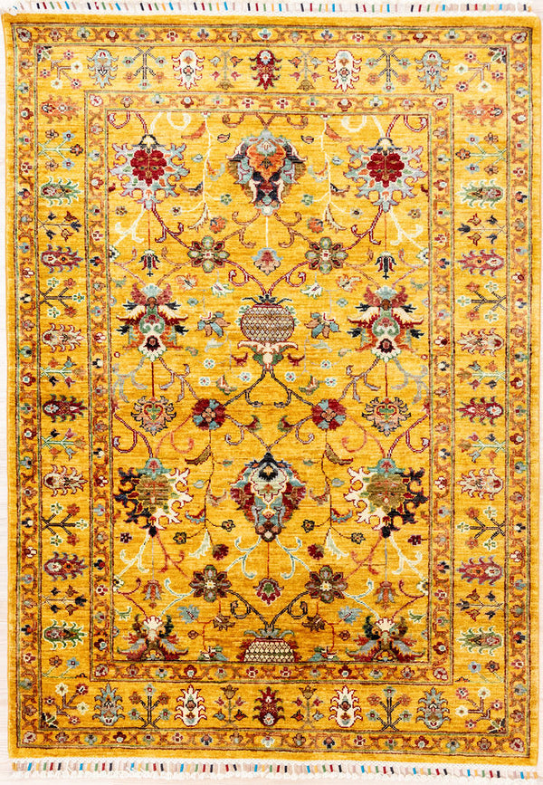 Authentic Hand Knotted&nbsp; Mustard Gold Afghan Sultani Chobi Wool Rug 171cm x 124cm woven in Shebarghan, Northern Afghanistan
a new and different colour combination of a shimmering gold field with multicolour baroque floral motifs all over.
Beautifully decorated with colourful, silk bound 'Ariana' tassels on each end
Colour tones all made from local vegetable/plant based dyes
Perfect to brighten your interior in both a contemporary and traditional setting.