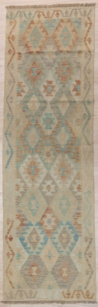 Authentic Hand woven Muted Afghan Boho Kilim Runner 249cm x 78cm&nbsp;
A long narrow runner in subdued pale muted field tones all over
Lovely soft contemporary colours
Durable and Wear Resistant Suitable for High Traffic Areas