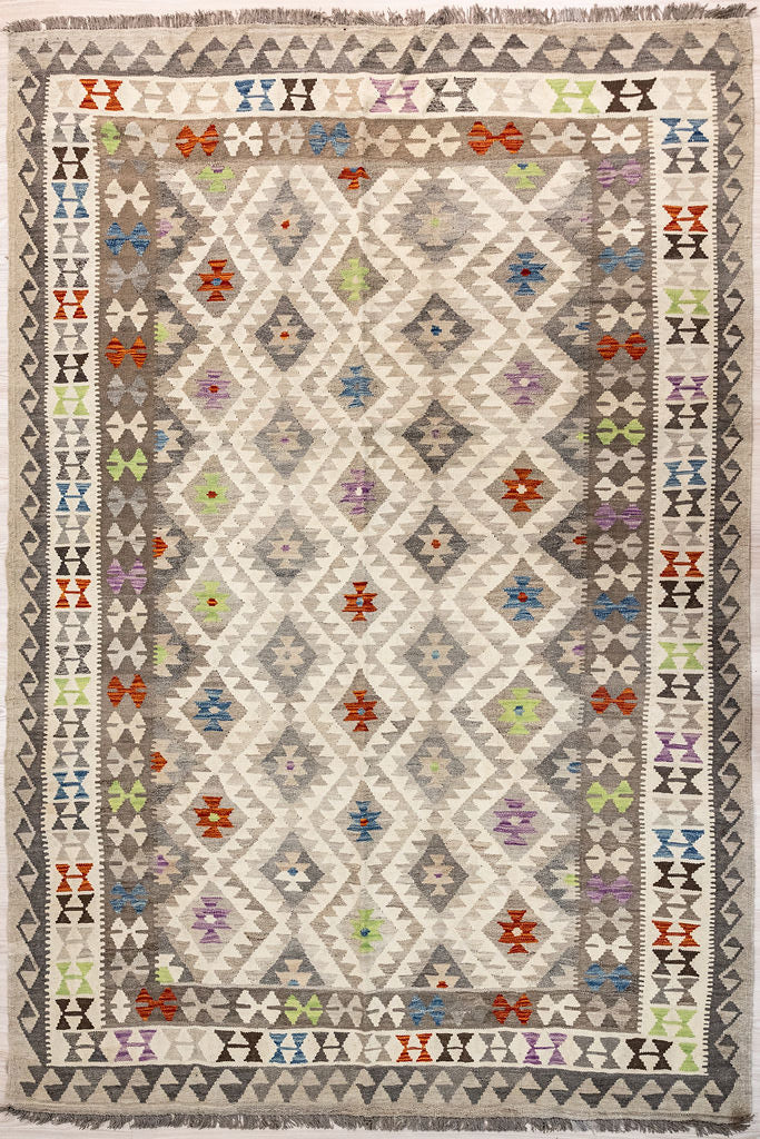 Authentic Hand woven Muted Afghan Boho wool Kilim 290cm x 198cm
Rug in subdued pale muted field tones all over
Lovely soft contemporary colours
Durable and Wear Resistant Suitable for High Traffic Areas
