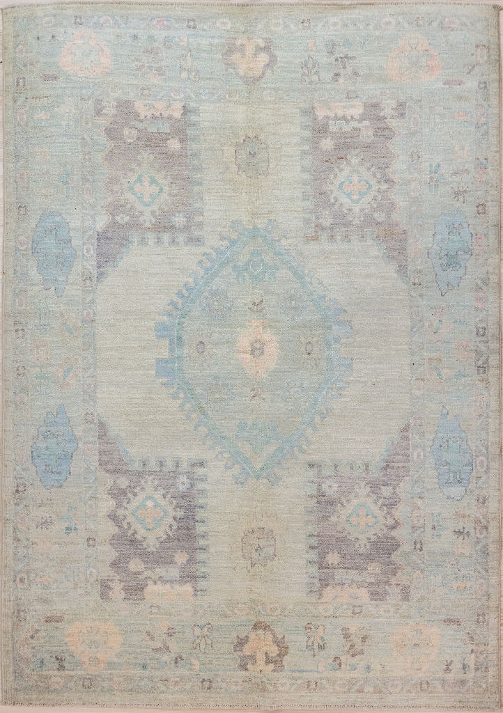 Authentic Handknotted Muted Afghan Chobi Wool Rug 205cm x 149cm
Beautiful muted tones all made from natural vegetable dyes, grey, light blues  creams
Unique contemporary/traditional design depicting the four winds or four corners of the earth. Lighten up your home with this comfortable new wool rug.
Having a light and dark side is a trademark of Handmade Rugs
Durable and Wear Resistant Suitable for High Traffic Areas