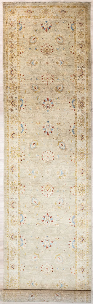 Predominantly cream with soft motifs Muted Afghan Chobi Wool Runner 330cm x 82cm woven in Central Afghanistan

Rare combination of muted earthy tones with light blue and ruby red florals
Having a light and darker aspect is a trademark of Handmade Rugs
Durable and Wear Resistant.&nbsp; Suitable for High Traffic Areas
All Colours in This Piece Originate from Natural Vegetable Dyes