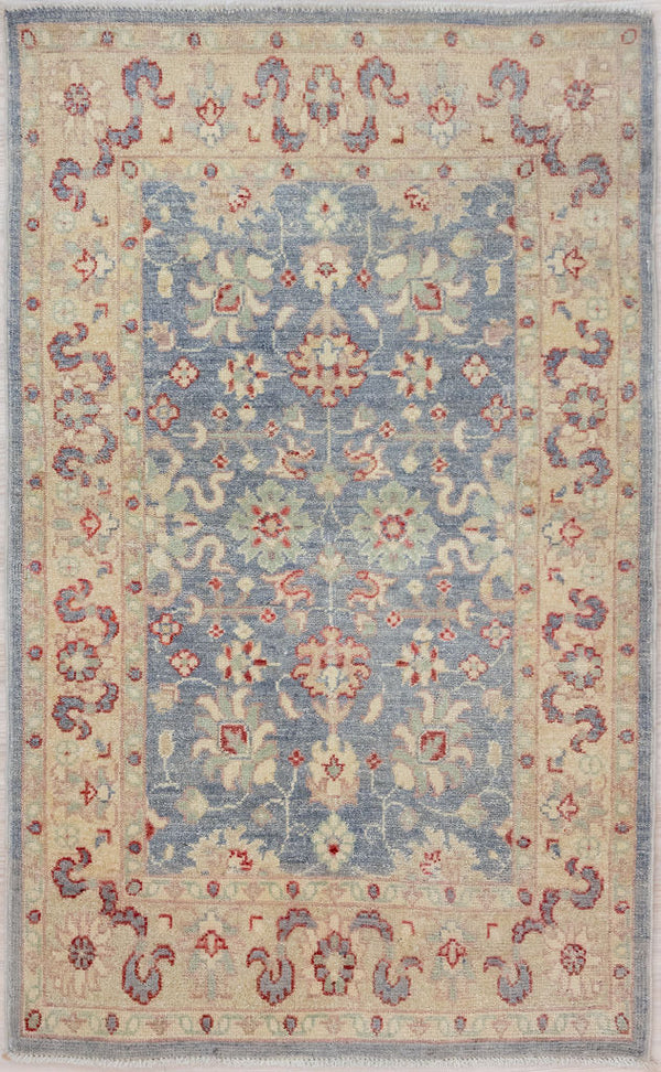 Authentic Handknotted  Muted Blue Afghan Chobi Wool Rug 126cm x 80cm
Beautiful muted tones all made from natural vegetable dyes. Washed out Indigo fawns and creams pinks and touches of red all held within a wide cream border.
Grey rain-bearing "cloud band " motifs feature in this border as well as more white clouds in the sky blue centre of the rug. This design suggests a connection to Tibet
Unique contemporary traditional design adaption suitable to brighten your interior.