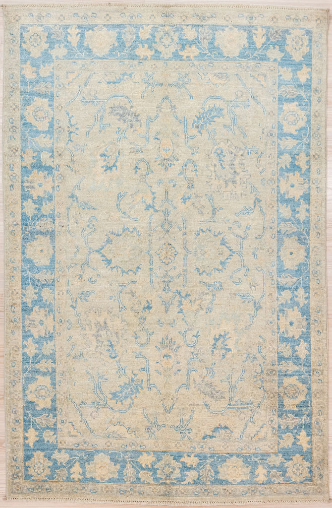 Authentic Hand Knotted Muted Blue Afghan Chobi Wool Rug 180cm x 118cm woven in Shebarghan, Northern Afghanistan.
Another addition to the Blue and white decor toolbox.
Pale Hand dyed fawn and natural cream wool spun together gives a soft, antiqued, parchment background look.
Simple no fuss short fringes.
Colours all made with natural vegetable dyes like Indigo and Woad
Having a light and darker side is a trademark of Handmade Rugs
Looks can deceive! This rug is made with soft Durable mountain wool.