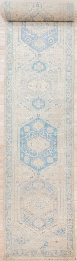 Authentic Hand knotted&nbsp; Muted Blue XXL Afghan Chobi Wool Runner 763cm x 86cm a splendid larger size
Finely hand knotted by female artisans of Northern Afghanistan.
Pale Indigo and cream is a desirable. way to lighten and brighten your hallway.
Pale they may be but these Chobi quality runners are hardwearing and last. The Victorians used this colour trick to brighten dark mansions and many of these Zeigler style rugs are still in use today
