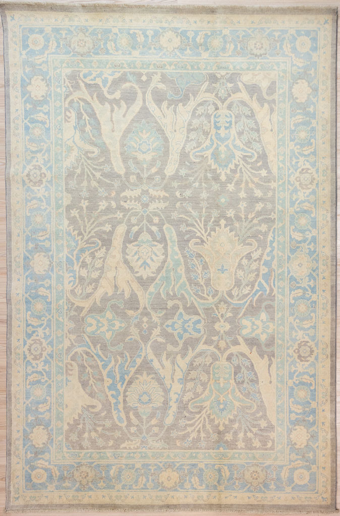 Authentic Handknotted Muted Grey Brown Afghan Chobi Wool Rug 297cm x 204cm&nbsp;
Beauitful muted colours, light blues, grey browns and creams all made from natural vegetable dyes or natural wool colours.
Unique asymmetrical contemporary adaption of a traditional acanthus leaf design. Harking back to Roman times this plant was a symbol of immortality and rebirth. Herbal uses of this plant include aiding in the treatment of kidney stones, a big issue if medicine and surgery are not available

Durab