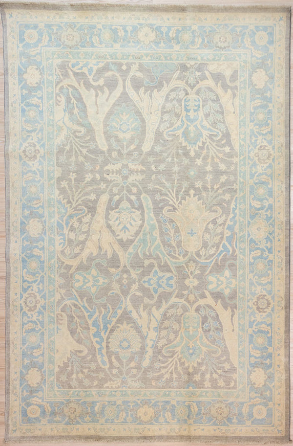 Authentic Handknotted Muted Grey Brown Afghan Chobi Wool Rug 297cm x 204cm&nbsp;
Beauitful muted colours, light blues, grey browns and creams all made from natural vegetable dyes or natural wool colours.
Unique asymmetrical contemporary adaption of a traditional acanthus leaf design. Harking back to Roman times this plant was a symbol of immortality and rebirth. Herbal uses of this plant include aiding in the treatment of kidney stones, a big issue if medicine and surgery are not available

Durab