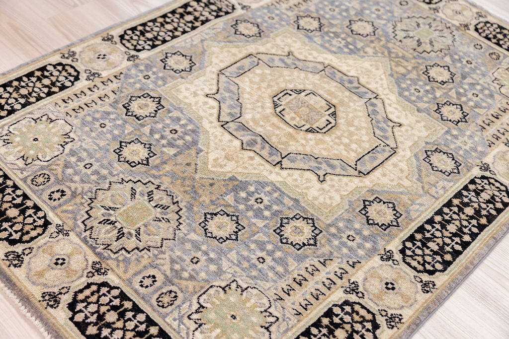 Authentic Hand knotted Muted Mamluk Afghan Chobi Wool Rug 154cm x 102cm woven in Shebarghan, Afghanistan
Inspired by the ancient Egyptian Mamluk design which consists of a Geometric patterns all over.

This rug could be great with the eternally popular blue and white decorating theme or anywhere that a paler palette, but still a traditionsl look, is desired.
Durable and Wear Resistant Suitable for High Traffic Areas