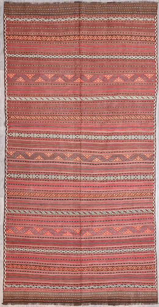 Authentic Muted Red Persian Vintage Kilim Wool Rug 318cm x 157cm in soft ochre,&nbsp; pale indigo, soft pinky red and warm beige. All natural veg dyes.
This one-off design rug features multiple striped patterns.&nbsp;This portable rug really can also go with you on&nbsp; your meanders and travels, or on picnics or camping trips
The colour tones have muted over the decades and the wool has softened. Fringes are short and practical.

Nice for galley kitchen or sunroom or foyer.