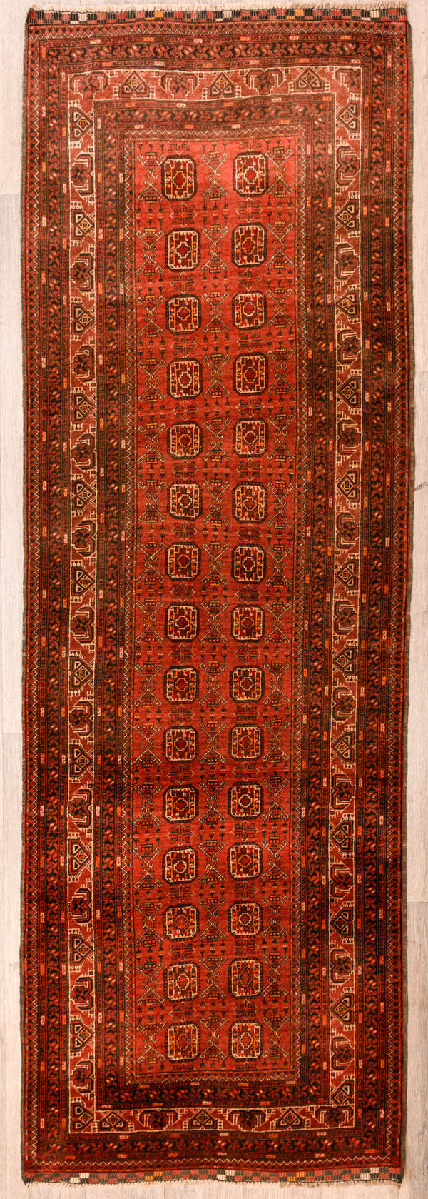 Muted Red Semi-Antique Fine Turkoman Bokhara Wool Runner 295cm x 97cm a very beautiful fine weaving with lovely repeating  bokhara guls within a finely detailed border.