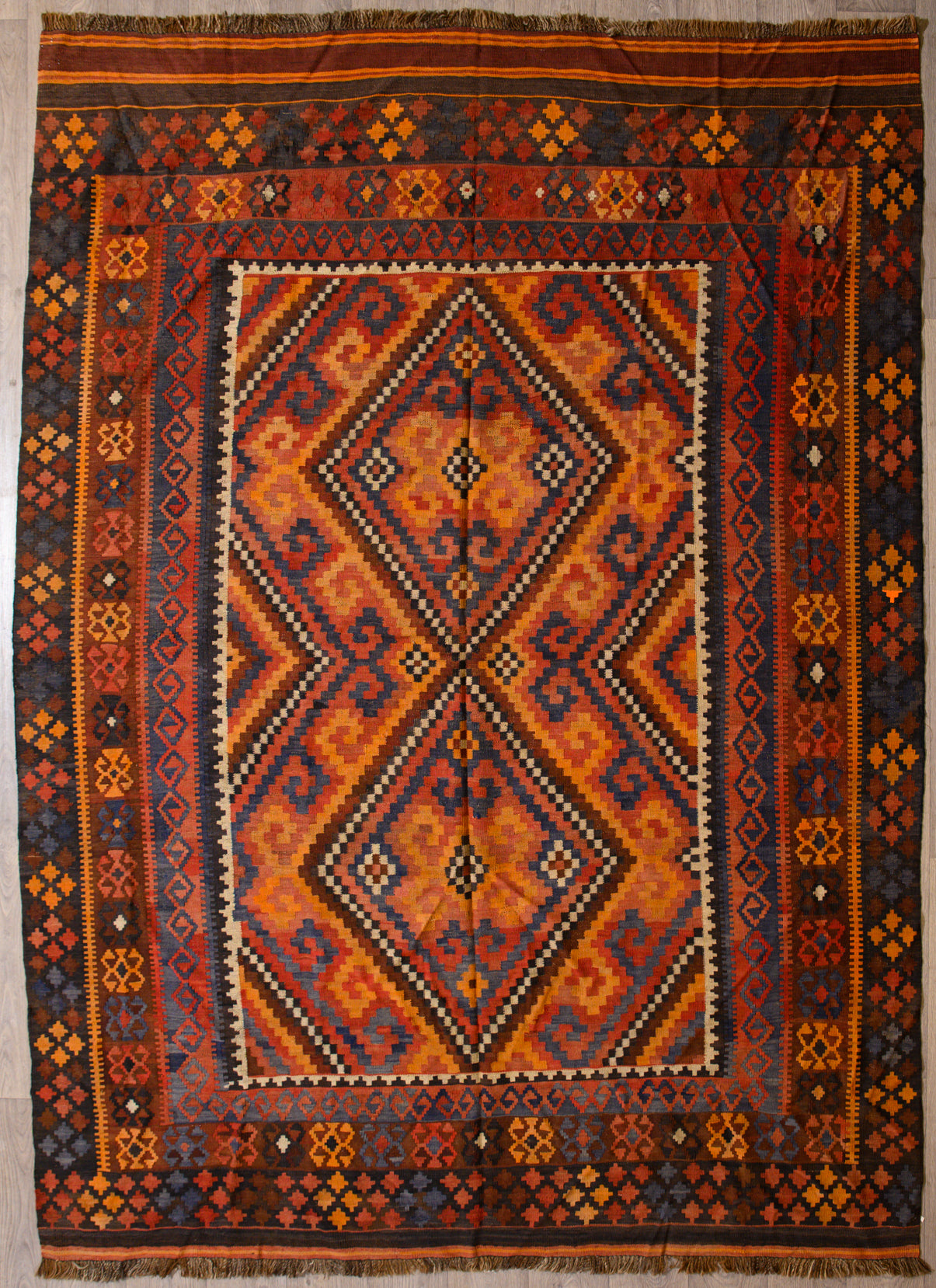 Authentic Handknotted Muted Vintage Persian Kilim 309cm x 224cm
Vintage Kilim handwoven in the early 1960'sKilims are a light flatweave reversible rug used for over a millennium by the nomadic tribes of Central Asia&nbsp;