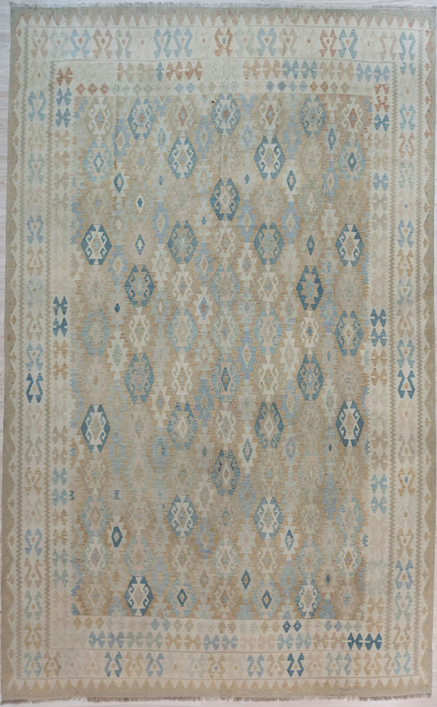 Authentic Handknotted rare Muted XL Boho Afghan Wool Kilim 396cm x 299cm
Unique washed out look achieved with different shades of wool including natural undyed wool.
Kilims are a flatweave rug used for over a millennium in Tribal areas of Central Asia Anatolia. Historically used by nomads as floor covering, tent covering, transported&nbsp; on horseback because of its lightweight nature
Perfect for a summer rug, coastal or to bring more character and life into your interior
Durable and Wear Resistant Suit