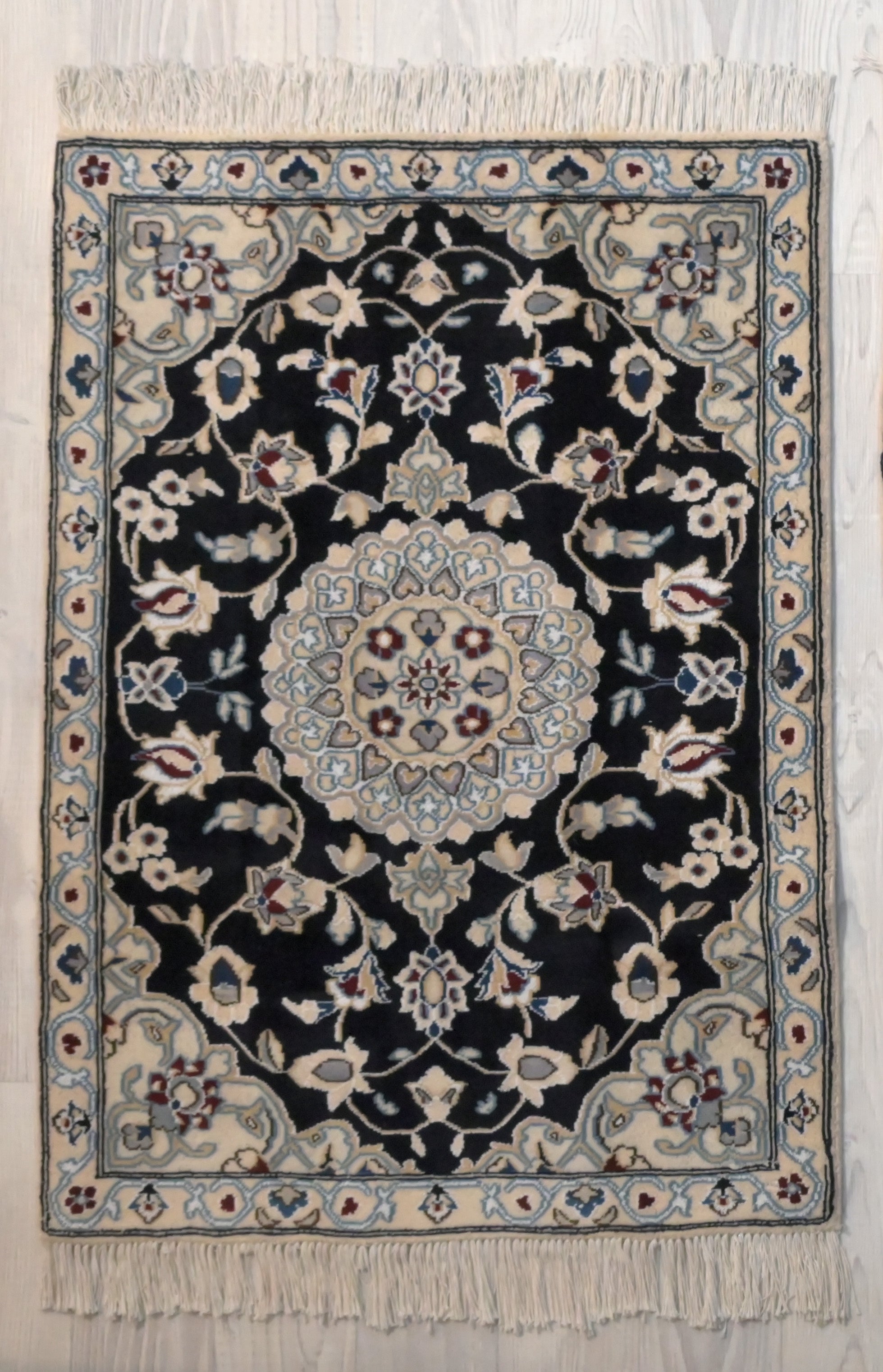 Authentic Handknotted Navy Persian Nain Silk n Wool Rug 138cm x 85cm
A little bit of luxury for your special place In light delicate naturally dyed tones