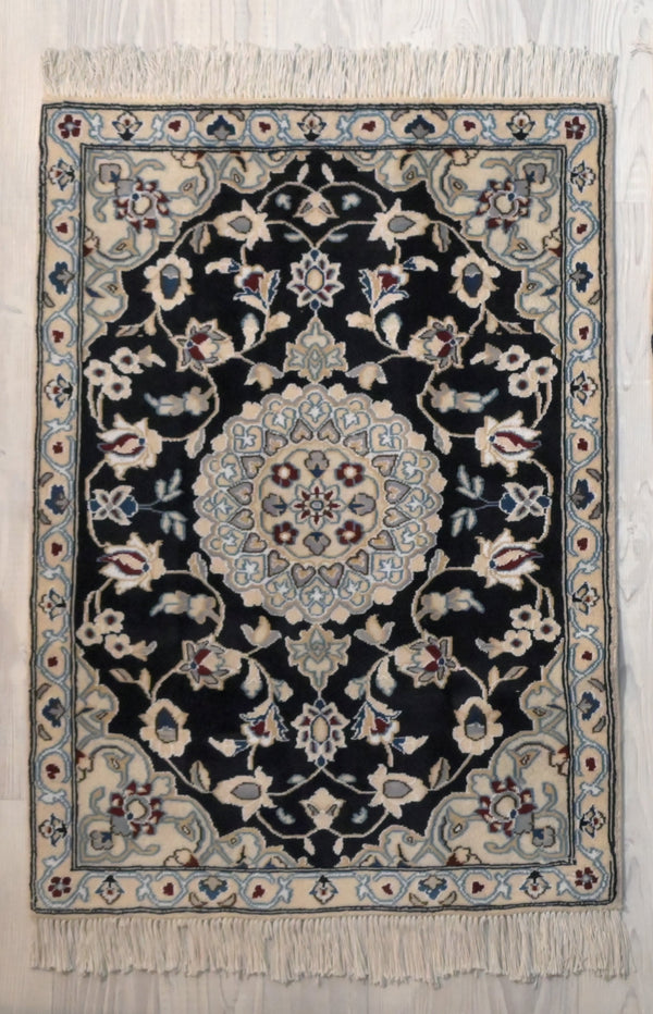 Authentic Handknotted Navy Persian Nain Silk n Wool Rug 138cm x 85cm
A little bit of luxury for your special place In light delicate naturally dyed tones