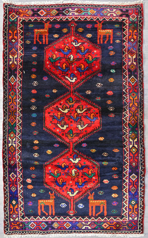 Authentic Hand knotted Pictorial Persian Tribal Navy Rug 157cm x 95cm
Tribal design in strong indigo and red. delightful rural design with birds and animals
Having a light and darker aspect is a trademark of Handmade Rugs
Durable and Wear Resistant Suitable for High Traffic Areas