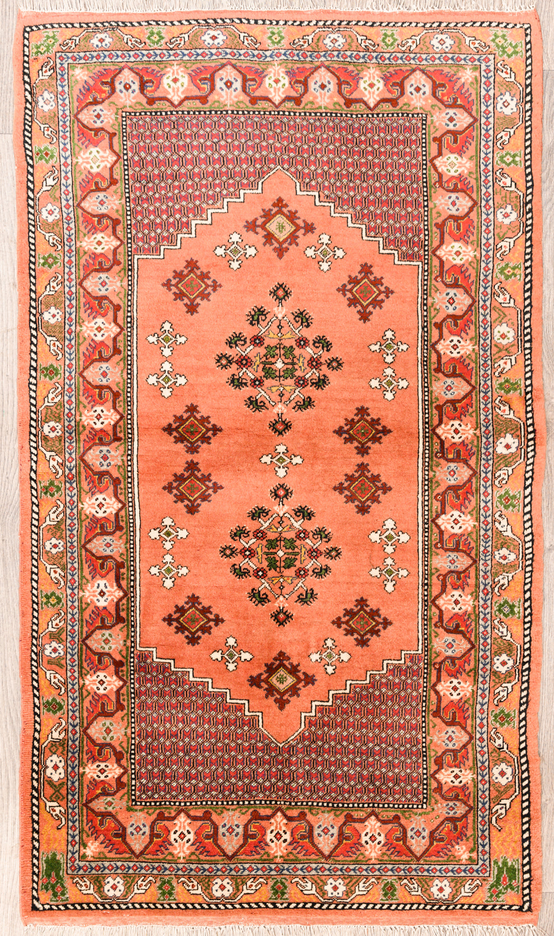 Authentic Handknotted Pink Afghan Herati Silk n Wool Rug 145cm x 84cm woven in the ancient city of Herat, Afghanistan
Finely handknotted with intricate weave wool on silk. Silk tassles showcasing the soft durable nature of silk material
Rare Herati rug, woven by a female artisan in the late 1980's post Soviet era
Rare pink tones, ideal for small interiors or can be displayed as wall art
