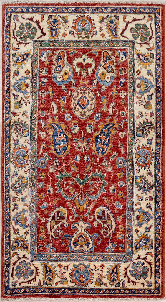 Authentic Handknotted. Afghan Chobi Wool Rug 169cm x 95cm woven in Central Asia

A unique adaption of traditional rug design bringing a touch of modern contemporary to your home.
Lovely colour palette of a soft Red field and a mix of other natural dyed colours pink, mustard, burgundy, green and indigo within a wide natural decorative cream border.&nbsp;
Features traditional boteh motifs, flowers and stylised vase designs.
Having a light and darker aspect is a trademark of Handmade Rugs
Durable and 