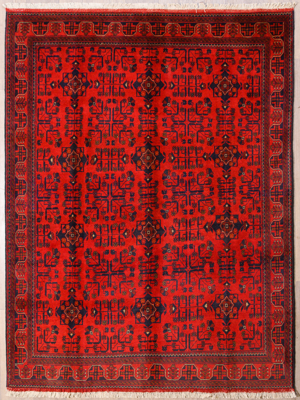 Authentic Hand woven Red Afghan Khal Wool Rug 240cm x 172cm&nbsp;
Most well known in the afghan rug range, unique broken tree design&nbsp;

Red colour tone made from the ancient method of dying using pomegranate skin and madder root.