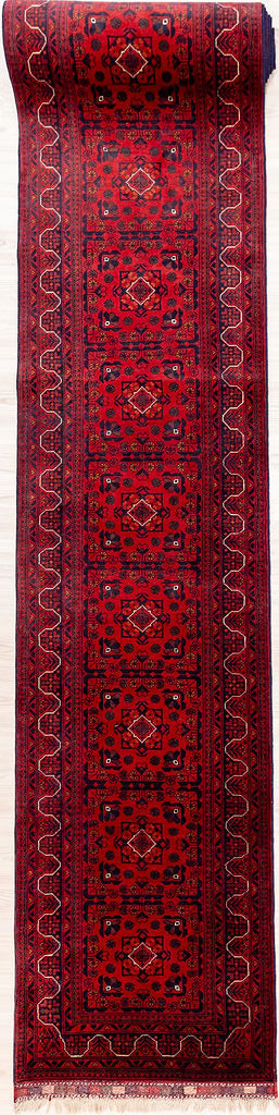 Authentic Hand knotted Red Fine Afghan Kundus Wool Runner 600cm x 81cm
A great practical runner for a long hall. Practical short fringes. More long runners available just ask.&nbsp;
This Kundus is in fine condition,, showcasing the immaculate skill of the weaver

Finely knotted elegant broken branch design with undulating niche style border detailed in cream.
Having a light and dark aspect is a trademark of Handmade Rugs