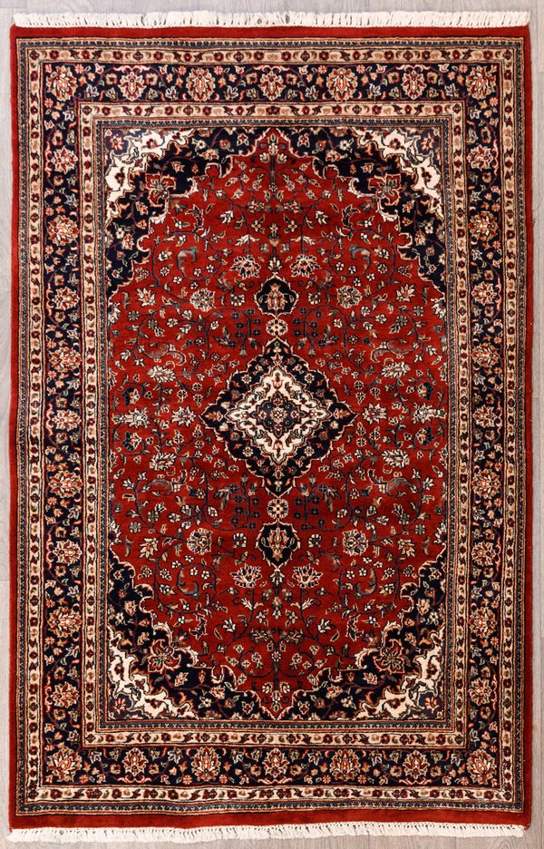 Authentic Handknotted Red Persian Kashan Wool Rug 187m x 120cm
Red field tone combined with a mix of blue; navy medallion
