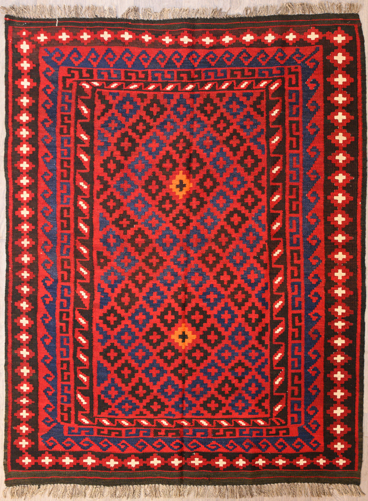 Authentic Handknotted Red Persian Maymana Kilim 197cm x 151cm 
Strong colours made with natural dyes such as madder root. Suits Boho, modern or MCM interiors.
Clever varied borders create movement every which way in this amazing rug which is a sampler of many border styles
Durable and Wear Resistant. Suitable for High Traffic Areas