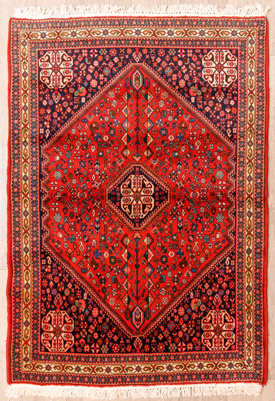 Authentic Handknotted Red Persian Shiraz Wool Rug 151cm x 106cm
Lighter Red &amp; Navy tones dominate the backdrop, pictorial motifs depict ancient Persian monuments&nbsp;

Having a light and dark side is a trademark of Handmade Rugs
Durable and Wear Resistant Suitable for High Traffic Areas
All Colours in This Piece Originate from Natural Vegetable Dyes