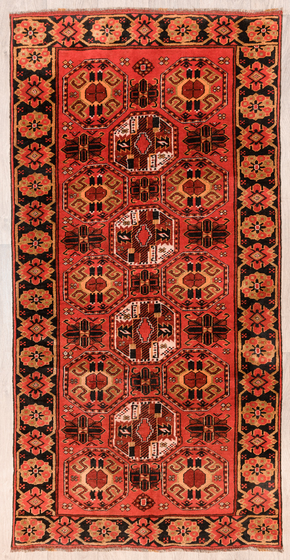 Red Persian Turkoman Bokhara Wool Rug 208cm x 104cm with stunning and intricate bokhara Gul designs typical of each tribals weaving group.