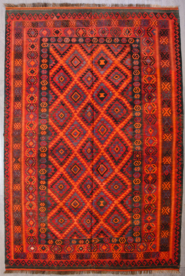 Authentic Handknotted Red Vintage Persian Kilim 311cm x 209cm&nbsp;
Vintage Kilim handwoven in the early 1980's. Kilims are a light flatweave reversible rug used for over a millennium by the Npmads of Asia.
Durable and Wear Resistant. Suitable for High Traffic Areas