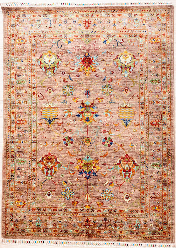 Authentic Hand Knotted Tea Rose Afghan Sultani Chobi Wool Rug 205cm x 151cm woven in Shebarghan, Northern Afghanistan
A new and different colour combination of a marled tea rose pink field with multicolour baroque floral motifs all over. This technique of hand dying and spinning gives a soft antiqued look.&nbsp;
Beautifully decorated with colourful, silk bound 'Ariana' tassels on each end
Colour tones all made from local vegetable/plant based dyes
This new rug is at home in both contemporary and traditional