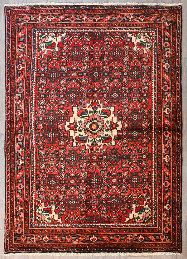 Bring a bold touch of Persian heritage into your home with our Thickpile Vibrant Persian Hamadan Rug. Handknotted in the ancient city of Hamadan, this rug boasts a classic pattern and is made of pure sheeps wool for a soft, luxurious feel under your feet. Measuring 204cm x 136cm, it's perfect for adding a vibrant touch to your room.