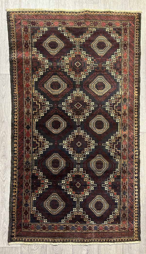 Authentic Handknotted Vintage Afghan Veg Dye Chobi Wool Rug Woven in the 1980's 140cm x 92cm
Having a light and dark side is a trademark of Handmade Rugs,
Remarkable all over tessellated design of squares.