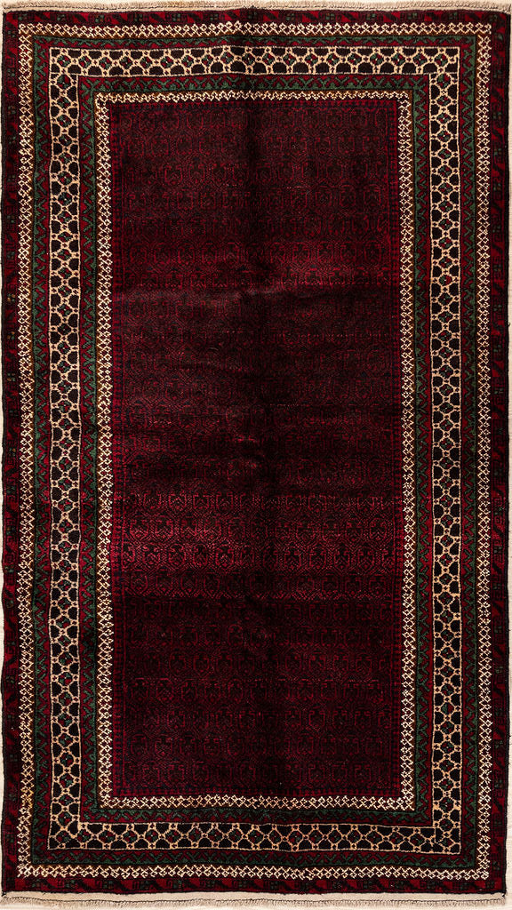 Authentic Hand Knotted Vintage Persian Baluchi Wool Rug 208cm x 115cm Woven in Central Asia.  Colour tones muted over the decades, yet it has a contemporaary modern appeal with restrained motifs and 3 simple borders