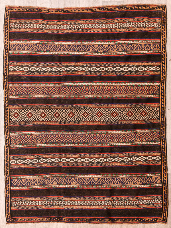 Authentic hand made Vintage Persian Wool Sumak 197cm x 150cm

Colour dyes made from Indigo and other local ground herbs  local berries
Durable and Wear Resistant. Has weight and hugs floor
Rare flashes of green.
Interesting stripes in complex woven patterns