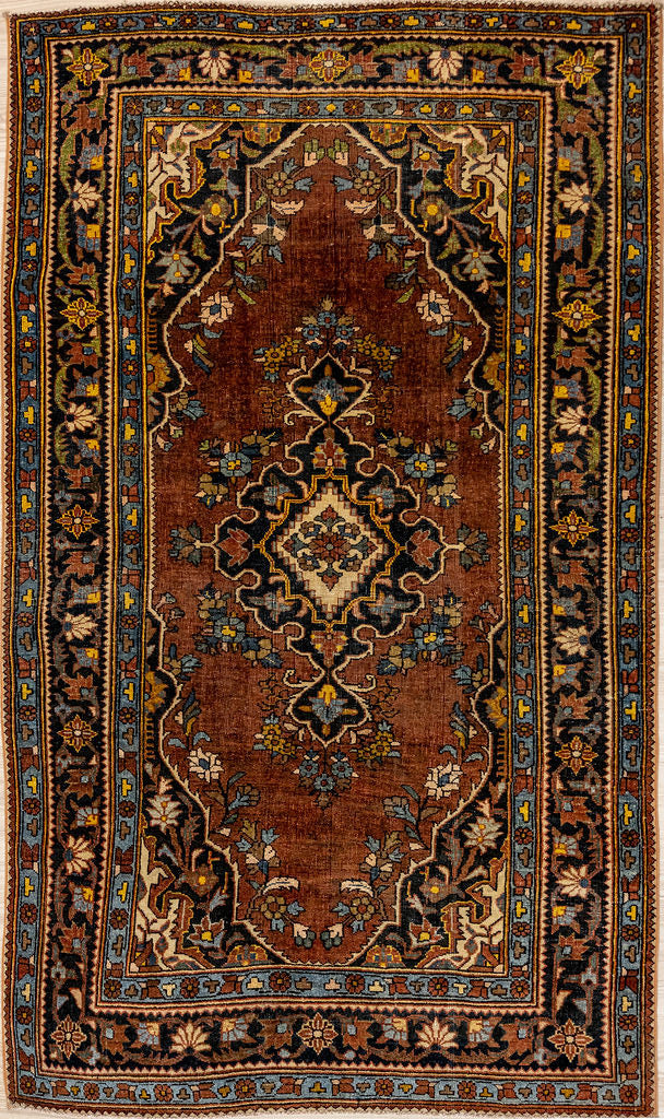 Authentic Hand knotted Vintage c.1960's Persian Hamadan Wool Rug 197cm x 123cm. Central medallion design. Woollen field coloured with traditional madder root dye giving a soft burgundy red.
A profusion of other elegant motifs and two lovely borders all displaying other natural dye tones at which Hamadan weavers excel. This rug has age but is evenly worn giving that desirable, shabby chic, boho vibe but you csn expect many more years of joy from it.