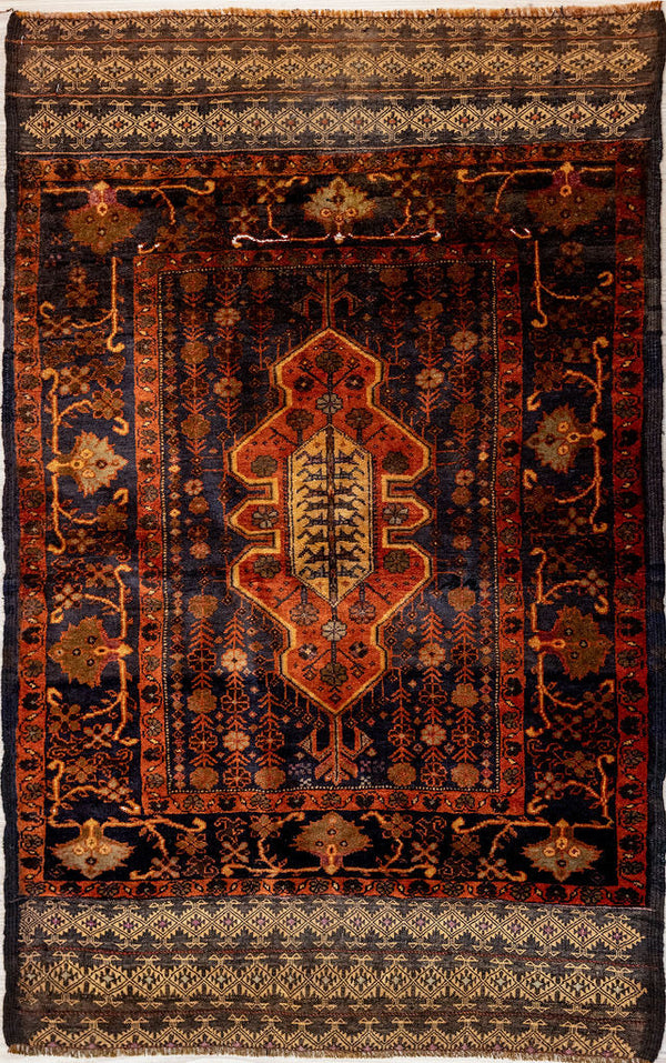 Vintage c.1970's Persian Baluchi Wool Rug 140cm x 90cm Woven in the 1970's in Central Asia
Colour tones muted over the decades, woolen pile reduced indicating the semi-antique lifespan of this rug
Gorgeous Rusty and indigo colours with three beautiful ornate kilim borders on each end for extra interest
