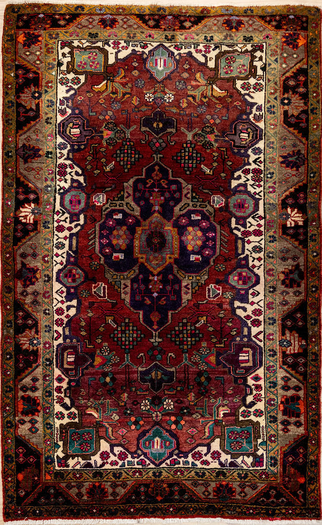 Bring a bold touch of Persian heritage into your home with our Vintage c.1970's Persian Hamadan Wool Rug 225cm x 137cm
Handknotted in the ancient city of Hamadan, this rug boasts a classic pattern and is made of pure sheeps wool for a soft, luxurious feel under your feet.
Rusty red and indigo with a purplish cast are typical colours for this rug style. All colours are natural vegetable dyes with techniques passed down over generations
Durable and Wear Resistant, Suitable for High Traffic Area