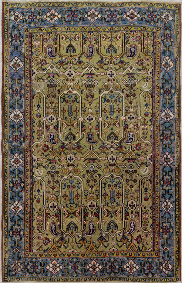 Bring a bold touch of Persian heritage into your home with our Vintage c.1970's Persian Qum Wool Rug 205cm x 135cm
Handknotted in the city of Qum, this rug has a classic arts and crafts revival  type pattern and is made of pure lambs wool for a soft, luxurious feel under your feet.
&nbsp;All colours are natural vegetable dyes giving soft greens, creams, browns and pale indigo all achieved&nbsp; with techniques passed down over generations&nbsp;

Durable and Wear Resistant, Affordable luxury.evival