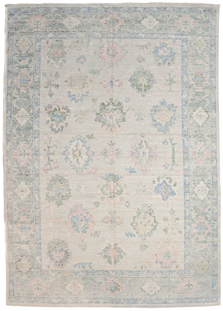 Authentic Handknotted  Afghan Chobi Oushak Design Wool area rug with a cream  background.Authentic Handknotted XL Ivory Afghan Chobi Oushak Design Wool Rug 421cm x 300cm suitable for large areas
Muted ivory, beige, green &amp; blue tones all made from natural vegetable dyes
Oushak Design light toned rug brightens your interior and opens your space