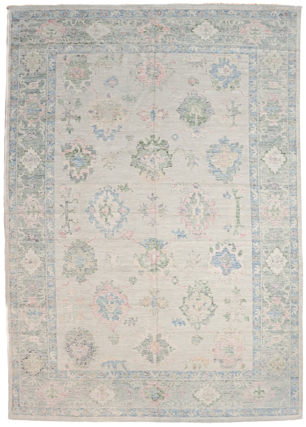 Authentic Handknotted  Afghan Chobi Oushak Design Wool area rug with a cream  background.Authentic Handknotted XL Ivory Afghan Chobi Oushak Design Wool Rug 421cm x 300cm suitable for large areas
Muted ivory, beige, green &amp; blue tones all made from natural vegetable dyes
Oushak Design light toned rug brightens your interior and opens your space
