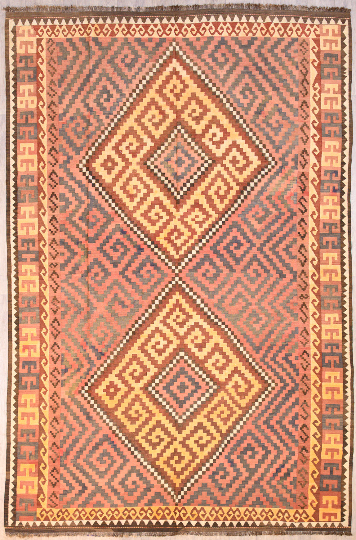 Authentic Handknotted XL Muted c.1950's Persian Kilim 384cm x 250cm
Vintage Kilim handwoven in the late 1950's in perfect condition. Exquisite muted light pink tones emphasising the graceful age of this beautiful one of a kind Kilim
Kilims are a light flatweave reversible rug used for over a millennium by the nomadic tribes of Central Asia&nbsp;
