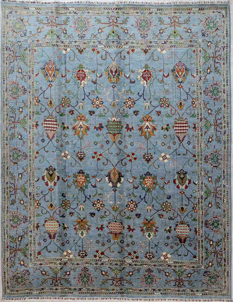 

Hand knotted Ice Blue Afghan Sultani Chobi Wool Rug 288cm x 248cm
A one of-a-kind botanical design completely rewriting the colour rules for a traditional oriental rug with its contemporary paler colour palette
Featuring &nbsp;cool ice blue this rug is at home in a modern architectural setting or particularly near water.
Ariana tassels woven on the top and bottom edges, by female artisans

;
