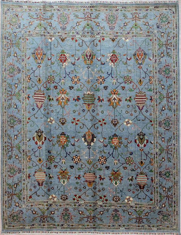 

Hand knotted Ice Blue Afghan Sultani Chobi Wool Rug 288cm x 248cm
A one of-a-kind botanical design completely rewriting the colour rules for a traditional oriental rug with its contemporary paler colour palette
Featuring &nbsp;cool ice blue this rug is at home in a modern architectural setting or particularly near water.
Ariana tassels woven on the top and bottom edges, by female artisans

;
