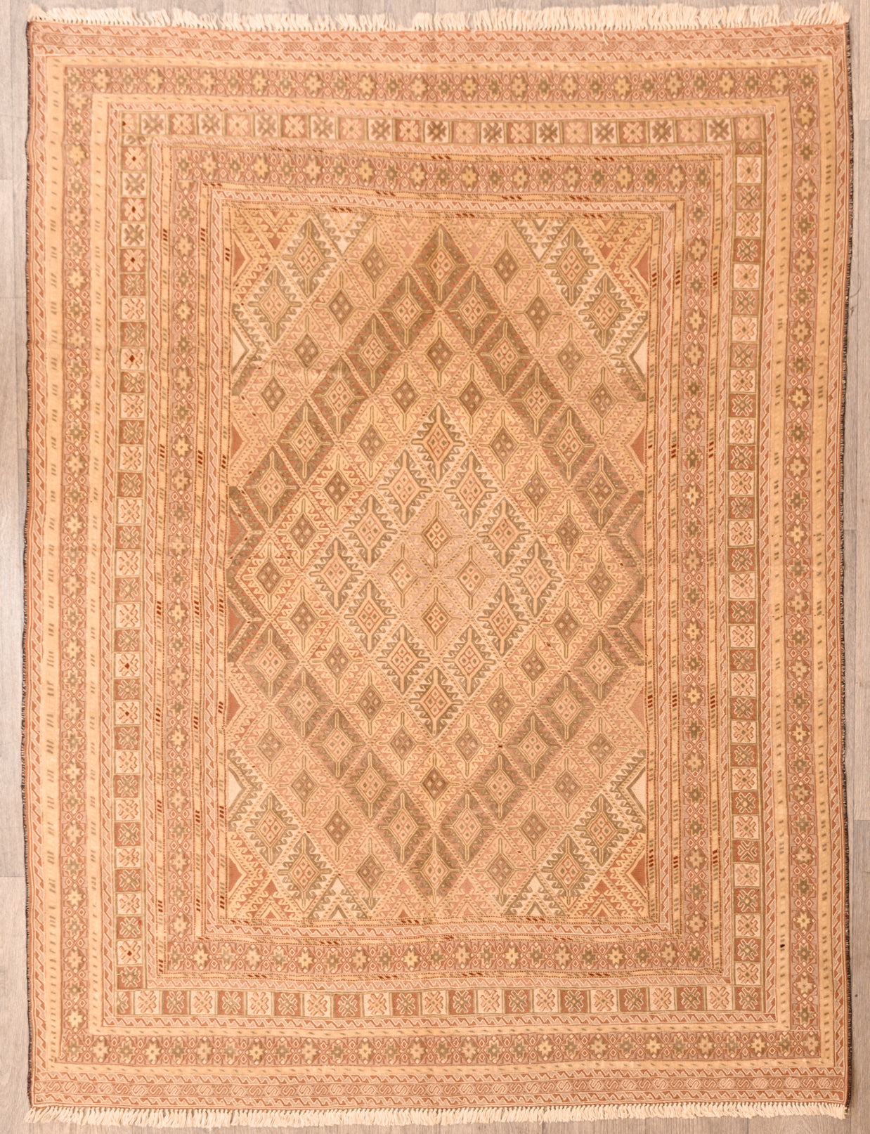 Authentic, high knot count intricate hand made Persian Sumak 207cm x 157cm

This delicate rug with subtle contemporary vegetable dyed colours is made to be loved.&nbsp;
Colour dyes include a rare light green and pink tone made from local ground herbs
Durable and Wear Resistant.