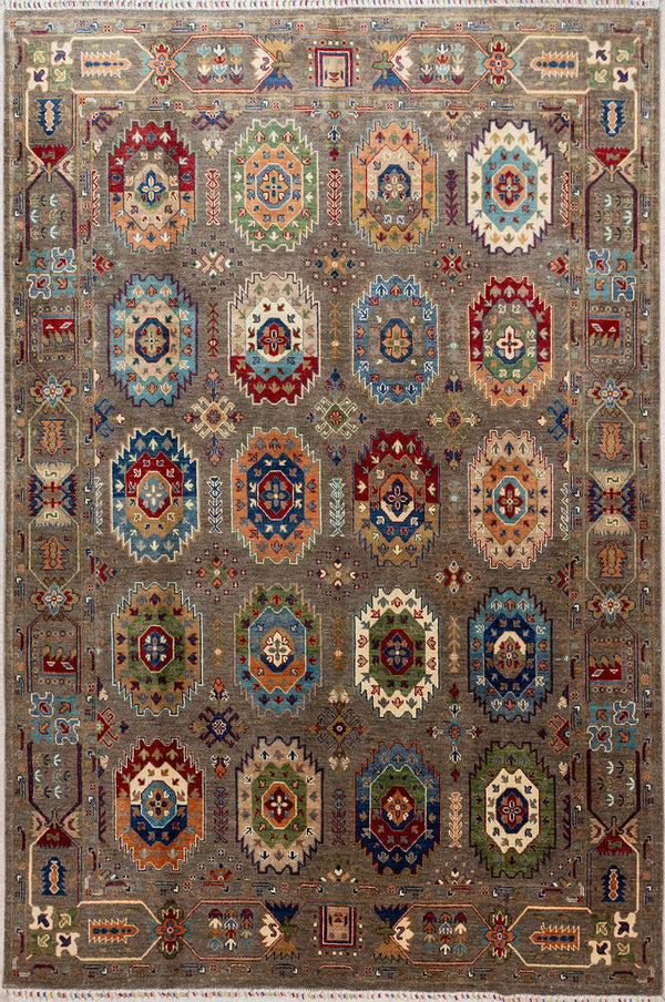 Grey Afghan Suzani Chobi Wool Rug 309cm x 232cm. Lovely combination of grey field with interesting varied "spot the difference" medallions all over.
Beautifully decorated 'Ariana' tassles on each end
Colour tones all made from local vegetable/plant based dyes
Perfect to brighten your interior in both a contemporary or traditional setting