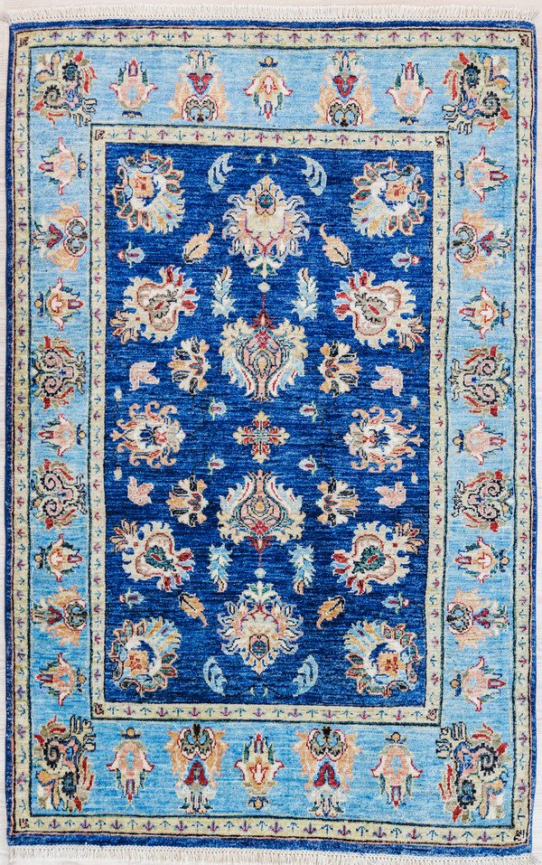 Blue Afghan Chobi Wool Rug 184cm x 125cm Floral design with centre field indigo