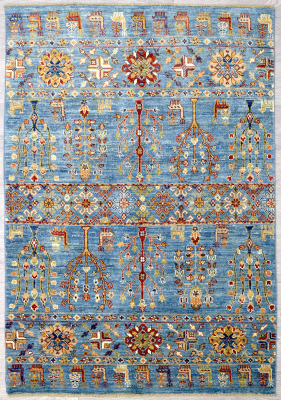 Traditional caucasian motifs reworked in a modern style and colours Guaranteed Original Handknotted Rug woven in Central Asia